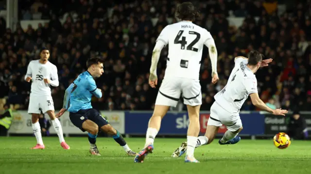 Crewe's Matus Holicek has an attempt at the Port Vale goal