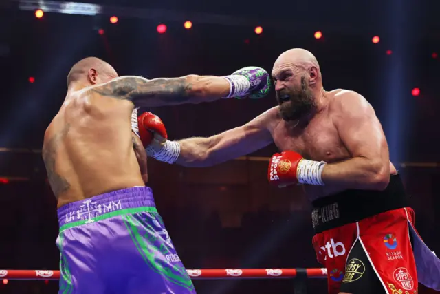 Tyson Fury punching Oleksandr Usyk