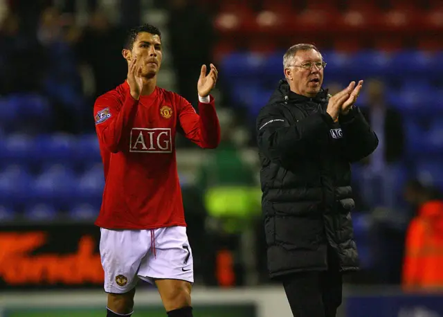 Cristiano Ronaldo and Sir Alex Ferguson applauding