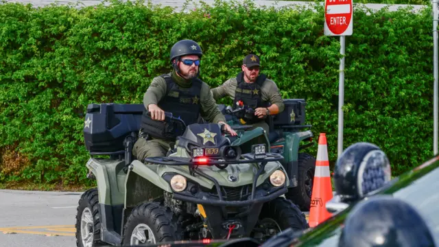 Law enforcement officers guard the surroundings of Mar-A-Lago, where the residence of Republican presidential nominee and former U.S. President Donald Trump is, after an apparent assassination attempt on him at his Florida golf course, in Palm Beach, Florida, U.S. September 16, 2024. REUTERS/Giorgio Viera