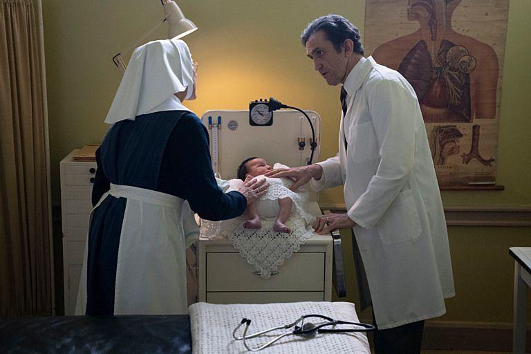 Sister Julienne (Jenny Agutter) and Dr Turner (Stephen McGann) with a baby on the set of the show