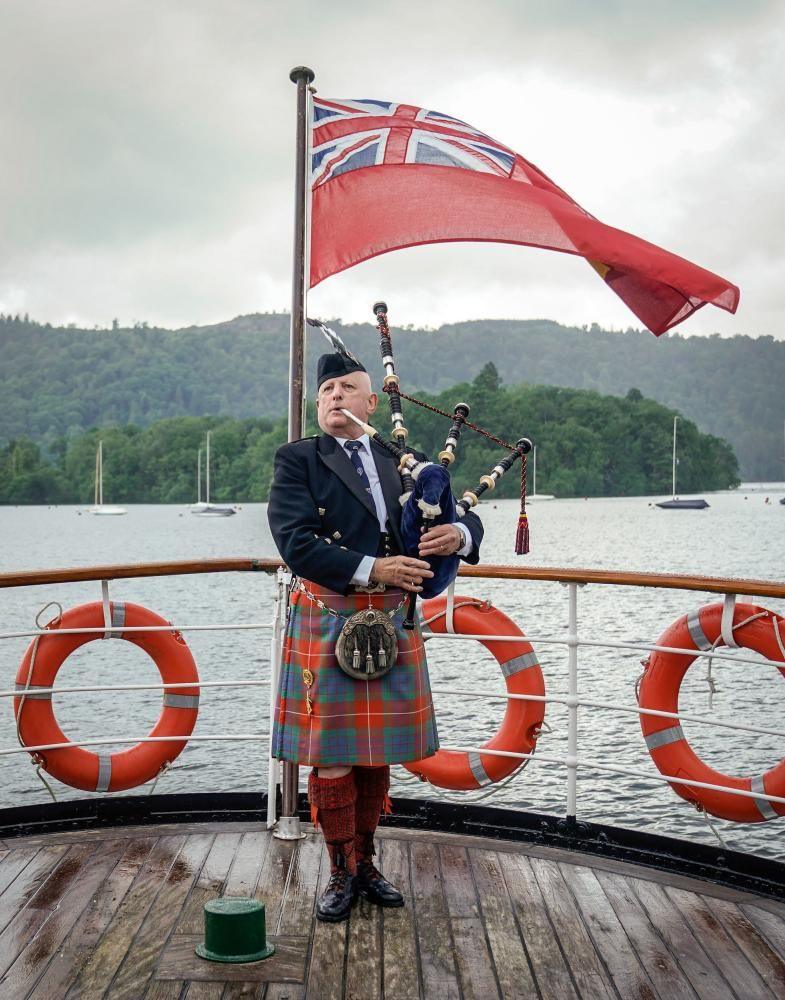 Lone bagpiper Richard Cowie