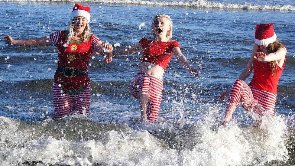 Dippers dressed in festive fancy dress in Tynemouth