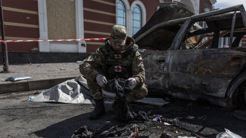 Some volunteers look for traces to help identify the corpses at Kramatorsk railway station after the missile attack in Kramatorsk, Ukraine on April 09, 2022