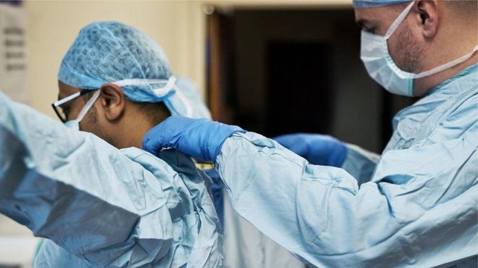 Hospital staff wearing PPE