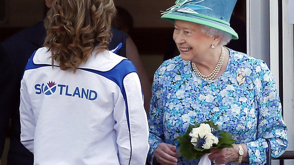 Queen Elizabeth II meets delegates and athletes on a visit to the Athlete's village during day one of the 20th Commonwealth Games on July 24, 2014 in Glasgow