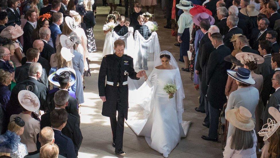 Pagesboys and bridemaids inside St George's Chapel