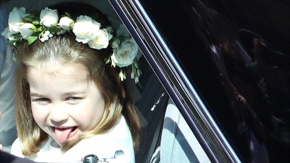 Princess Charlotte sticks out her tongue on her way to the wedding of Prince Harry and Meghan Markle