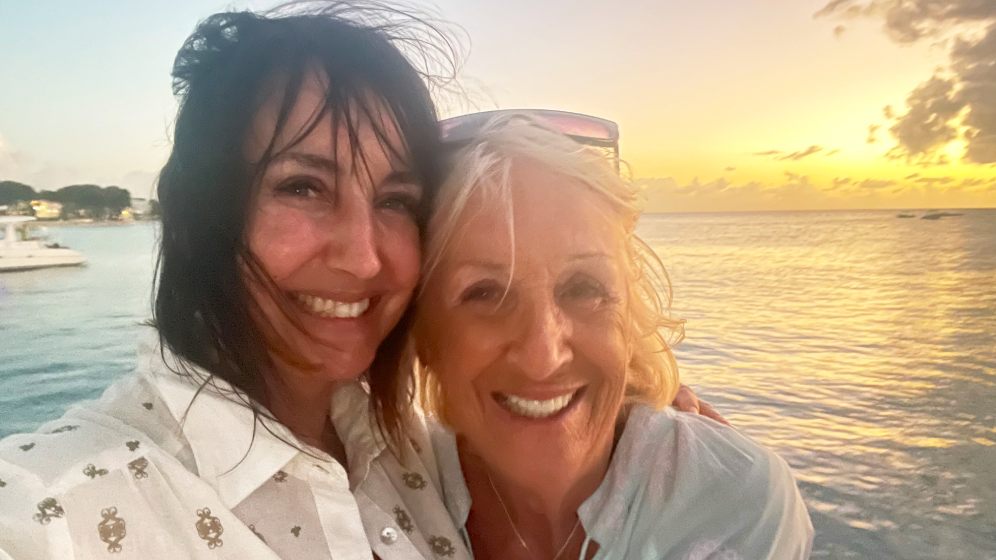 Lucy Owen with her mother Patsy Cohen, with the sea in the background