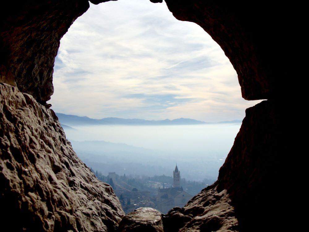 View of a town as seen from the mouth of a tunnel