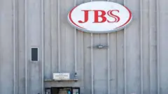 JBS logo at plant in Greeley, Colorado, April 2020 file picture