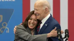 US Vice President Kamala Harris and US President Joe Biden reacts on stage during a campaign event at the Chavis Community Center in Raleigh, North Carolina, USA, 26 March 2024