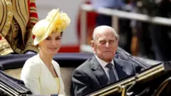 Prince Philip rides in a carriage with Spain's Queen Letizia,in 2017