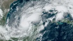 A satellite image shows Hurricane Milton intensifying before its expected landfall in Florida