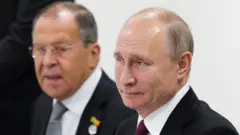 Sergei Lavrov and Vladimir Putin