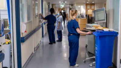 ile photo dated 18/01/23 of staff on a NHS hospital ward at Ealing Hospital in London.