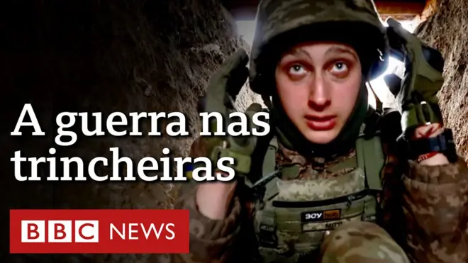 Soldado ucraniano se protege em trincheira