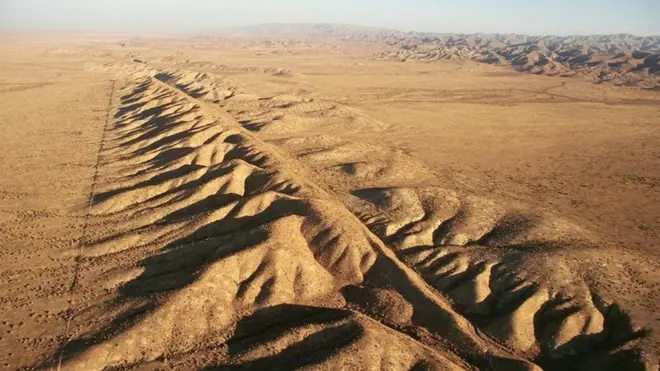 An aerial view of part of one of the world's most famous examples, the San Andreas fault in the US