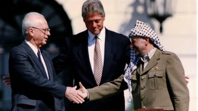 A peace accord was signed in the 1990s between Israeli Prime Minister Yitzhak Rabin (L) and PLO Chairman Yasser Arafat (R)