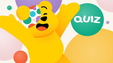 A cartoon Children In Need's Pudsey jumps in excitement, a spot has the word 'Quiz' on it.