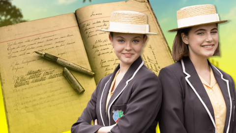 Two Malory Towers students standing in front of a diary