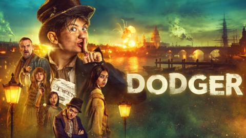 Characters from the new series Dodger feature in this image, they are wearing Victorian era clothing and Dodger, the main character, holds a shushing finger up to his mouth as he pockets some money.