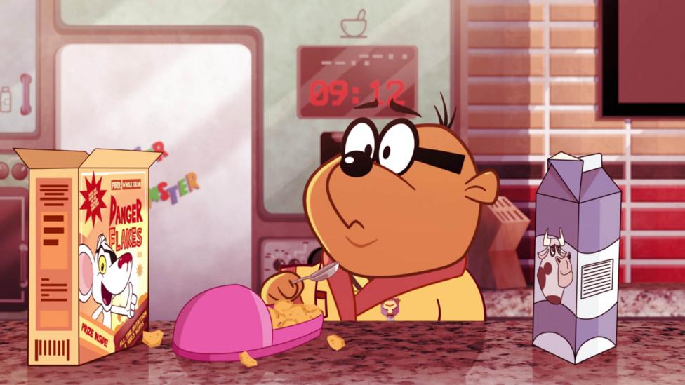 A cartoon hamster looks puzzled as he eats cereal out of a pink slipper (Penfold from Danger Mouse).