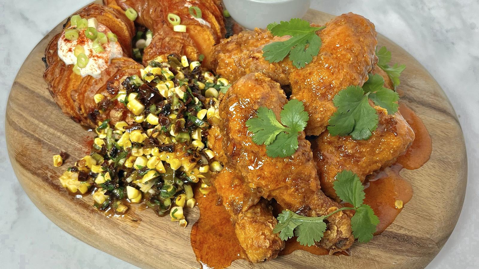 Buttermilk chicken wings, corn salsa and sweet potato hasselbacks