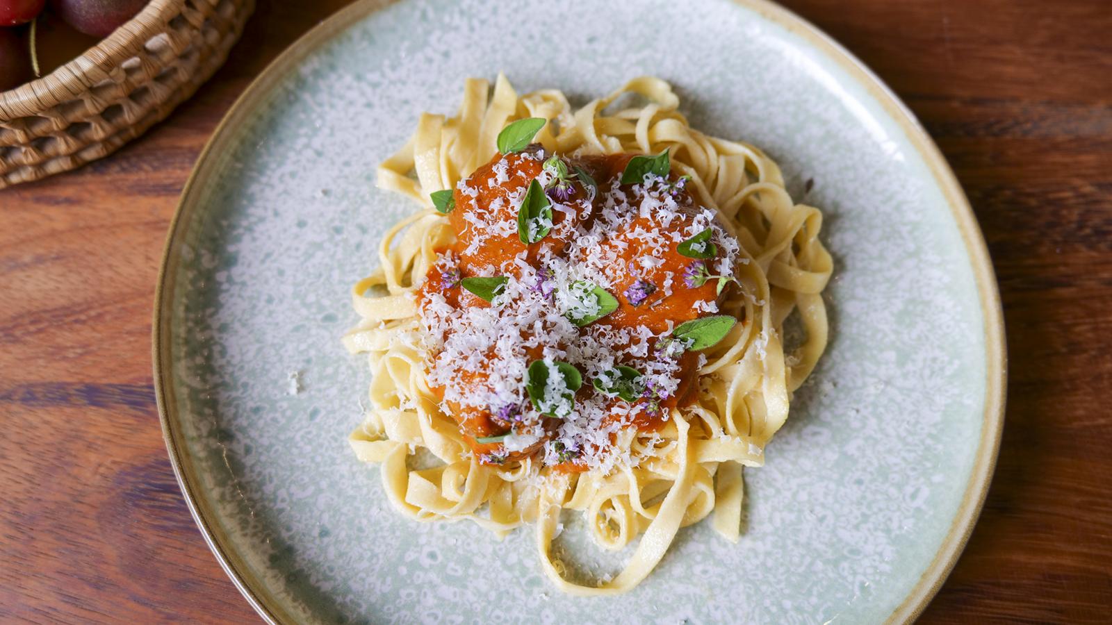 Meatballs in a rich ragu with homemade pasta