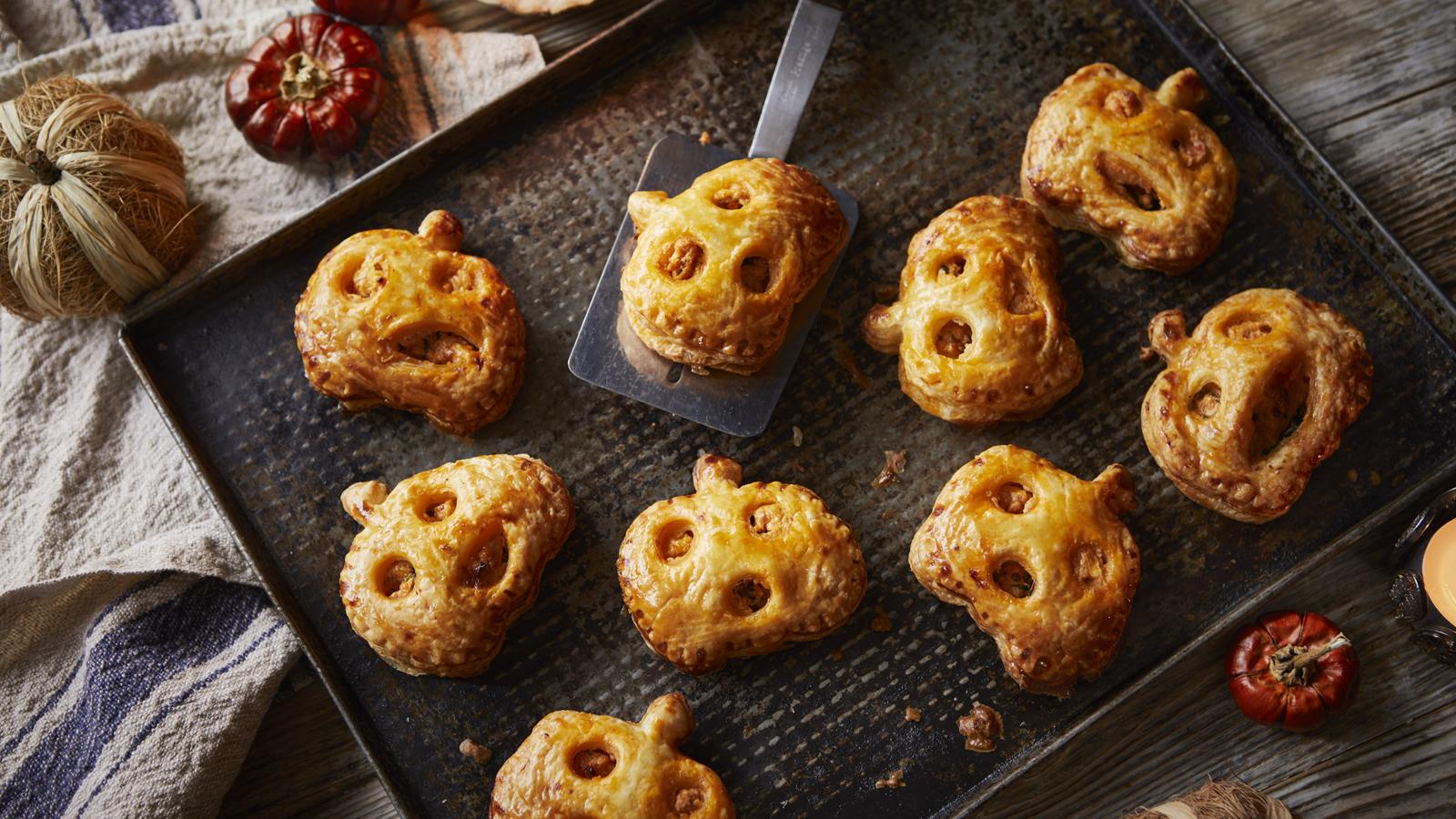 Pesto and spinach Halloween hand pies 