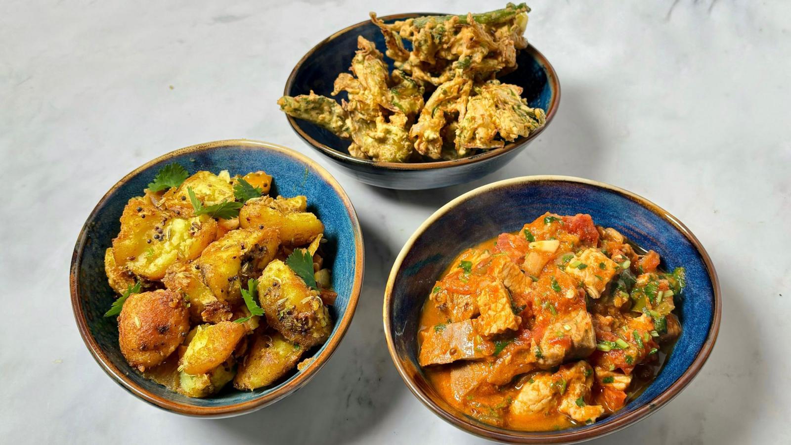 Turkey curry with bombay potatoes and pakoras