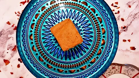 Sri Lankan love cake on blue patterned plate (Credit: Dhayanie Williams)