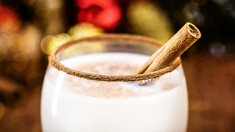 Cinnamon stick in creamy drink (Credit: Getty Images)