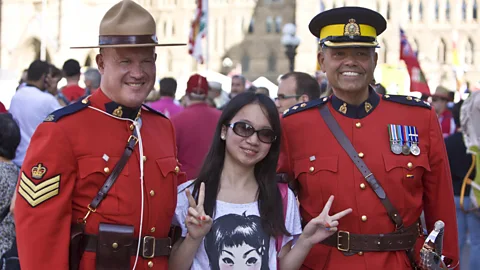 George Rose/Getty Royal Canadian Mounted Police celebrating Canada Day. (Credit: George Rose/Getty)