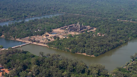 Alamy Angkor Wat has a massive moat surrounding the central temple complex – seen from the air, the entire site is remarkable for its precise 90-degree angles (Credit: Alamy)