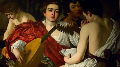 Alamy Baroque painters used cochineal red in works, such as The Musicians (1595) by Caravaggio (Credit: Alamy)