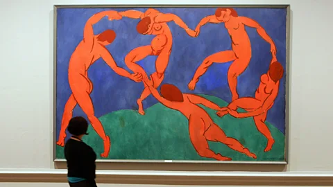 Getty Images Henri Matisse’s iconic painting The Dance was commissioned in 1909 by a Russian businessman to adorn the staircase of his mansion (Credit: Getty Images)