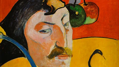 Alamy Self-portrait with Halo and Snake (detail), painted in 1889 by the post-Impressionist Paul Gauguin, contains two competing shades of orange (Credit: Alamy)