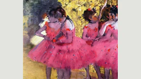 Alamy Dancers in Pink (1880-1885) by Edgar Degas is lifted by its striking hue and a style the artist called “premeditated instantaneousness” (Credit: Alamy)