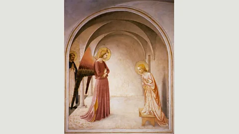 Alamy Fra Angelico’s fresco in Florence (1439-1444) depicts the archangel Gabriel in pink (Credit: Alamy)