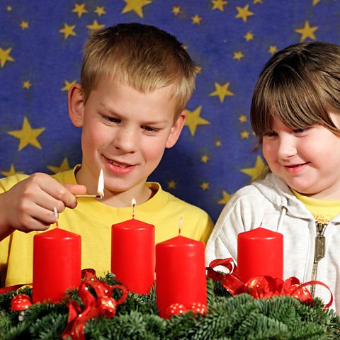 Children lighting an advent wreath