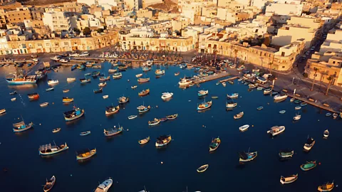 Felix Cesare/Getty Images Aerial view of the boats at Marsaxlokk harbour in Malta