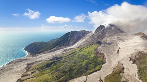 MichaelUtech/Getty Images In 1995, blasts from the Soufrière Hills volcano covered Montserrat's southern half in ash and soot (Credit: MichaelUtech/Getty Images)