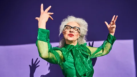 Flashpop/Getty Images Older woman dancing (Credit: Flashpop/Getty Images)