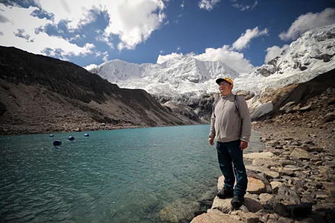 Luka Gonzales / Getty Images Farmer Saúl Luciano Lliuya is suing RWE for the role of its emissions in melting a glacier above his hometown in the Peruvian Andes (Credit: Luka Gonzales / Getty Images)