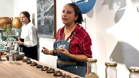 Lina Zeldovich Tour guide Andrea Izquierdo explains the history of chicha in Colombia (Credit: Lina Zeldovich)