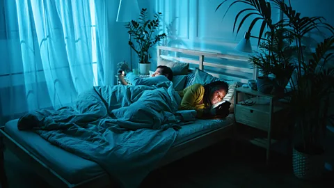 Getty Images Experts recommend people avoid bright lights and phone screens right before going to sleep (Credit: Getty Images)