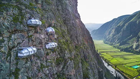 Natura Vive Sleeping pods on cliff face above Peru's Sacred Valley (Credit: Natura Vive)