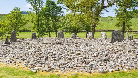 Getty Images The site is also home to five large burial mounds that form a vast linear cemetery through the glen (Credit: Getty Images)