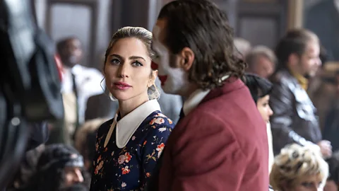 Warner Bros Joker: Folie à Deux sees its anti-hero Arthur Fleck on trial – and spends a lot of time reflecting on what happened in the first film (Credit: Warner Bros)